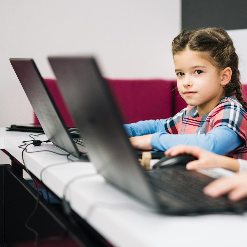 Young student using laptop for e-learning representing Algeria EdTech startup ecosystem